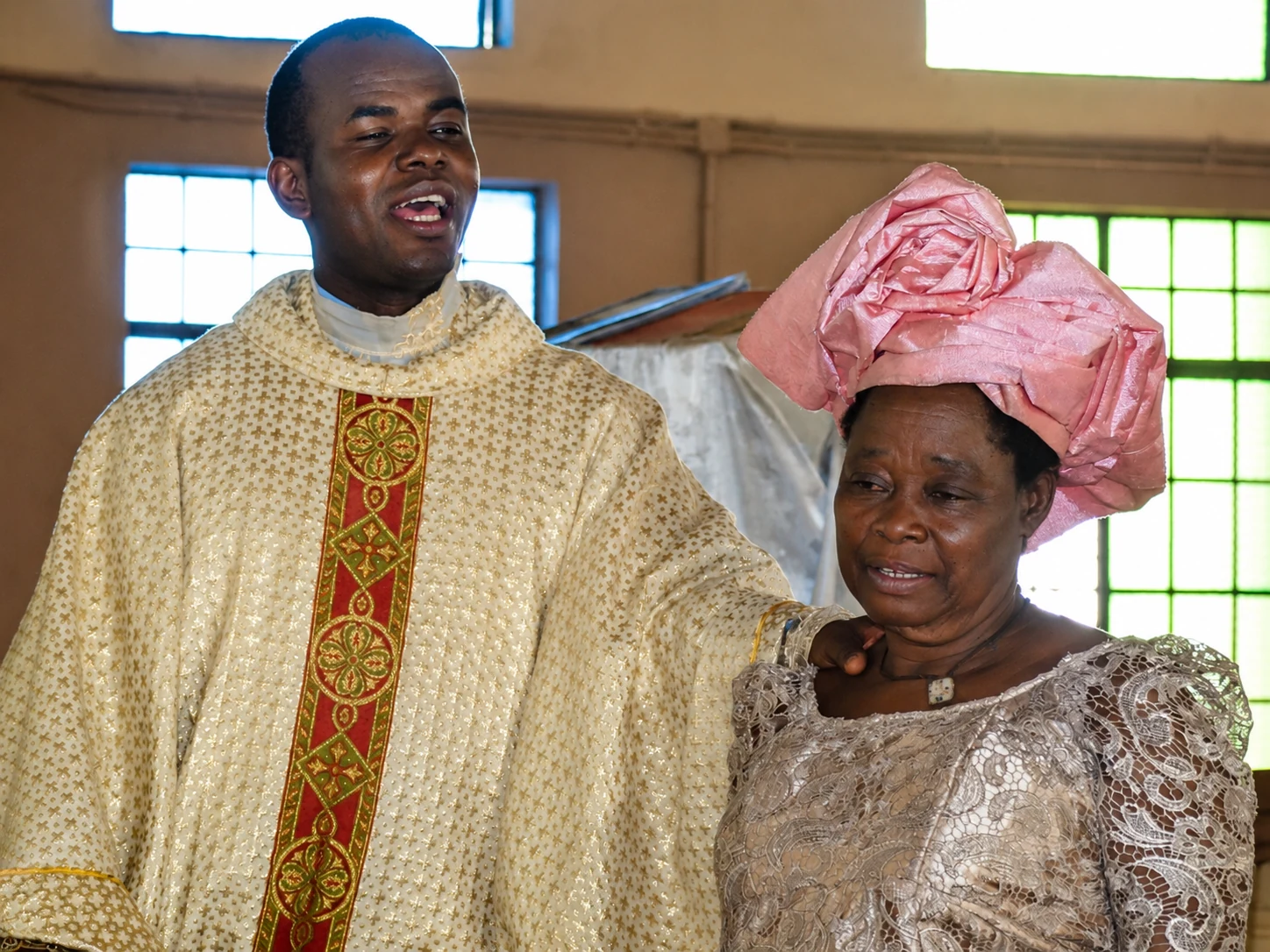 Rev. Fr. Ejike Camillus Mbaka blessing Margaret