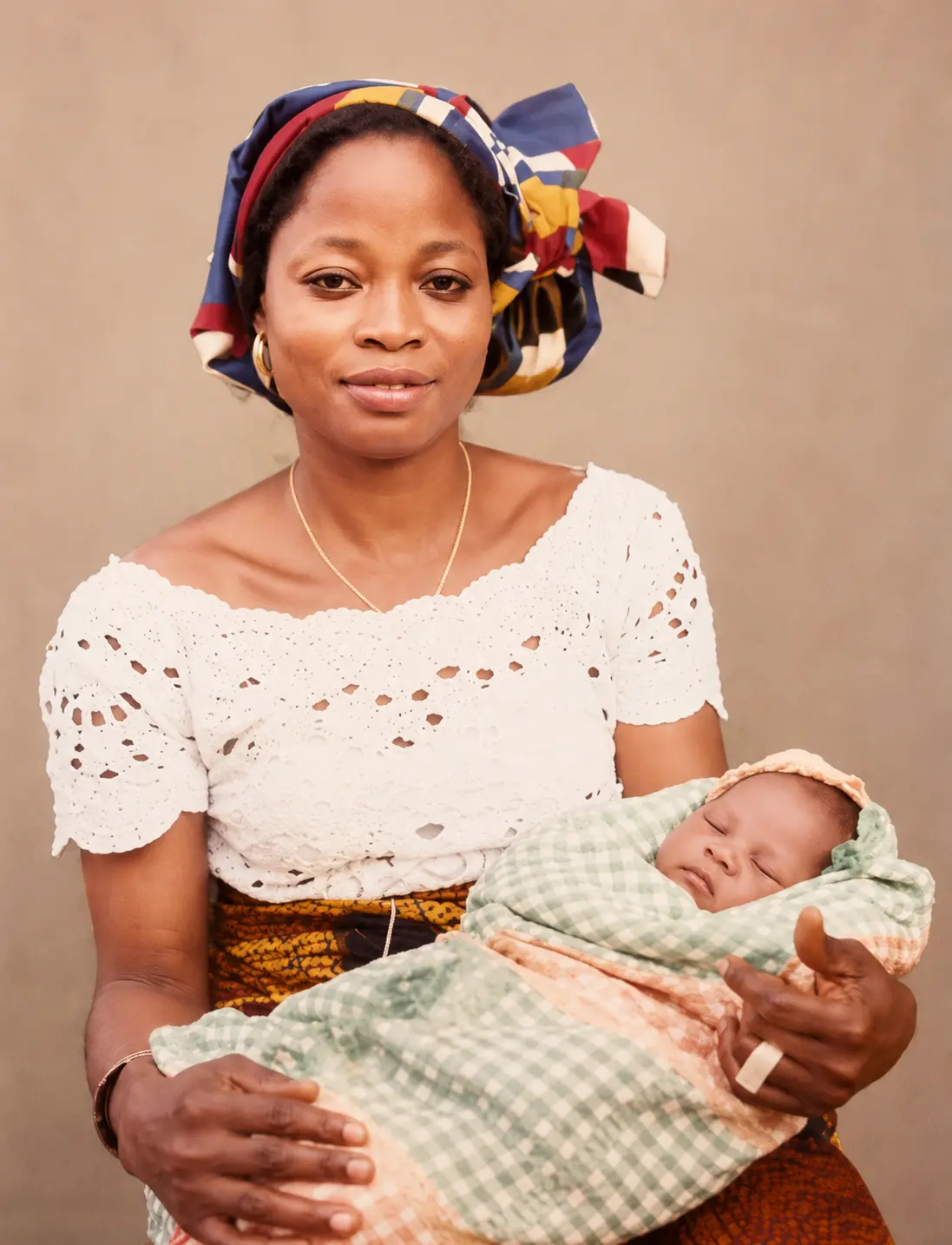 Engr. Uchenna Oguh holding newborn