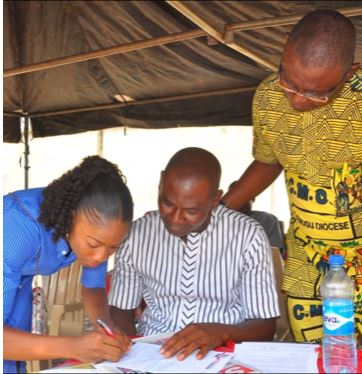 R-L: Chairman of the Scholarship Committee of the Peter Nwomeh Foundation (PNF), Pharm. Cyril Aninwike, Secretary, Board of Trustees, Mr. Dan Nwomeh and one of the PNF Scholars, Miss Deborah Okoye, a 2nd year student of Radiography, Nnamdi Azikiwe University, Awka, during the presentation of the Foundation's scholarship awards for the 2018/19 session, in Ozalla, Enugu State.